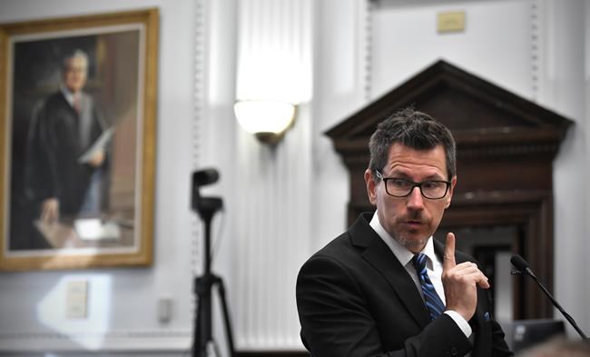 Assistant District Attorney Thomas Binger questions Koerri Washington during Kyle Rittenhouse's trial at the Kenosha County Courthouse in Kenosha, Wis., on Wednesday, Nov. 3 2021. Rittenhouse is accused of killing two people and wounding a third during a protest over police brutality in Kenosha, last year. (Sean Krajacic/The Kenosha News via AP, Pool)