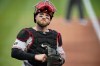Cincinnati Reds catcher Tucker Barnhart pauses between batters during a baseball game against the Pittsburgh Pirates in Pittsburgh, Tuesday, Sept. 14, 2021. The Cincinnati Reds traded veteran Gold Glove catcher Tucker Barnhart to the Detroit Tigers on Wednesday, Nov. 3, 2021, in exchange for infield prospect Nick Quintana. (AP Photo/Gene J. Puskar)