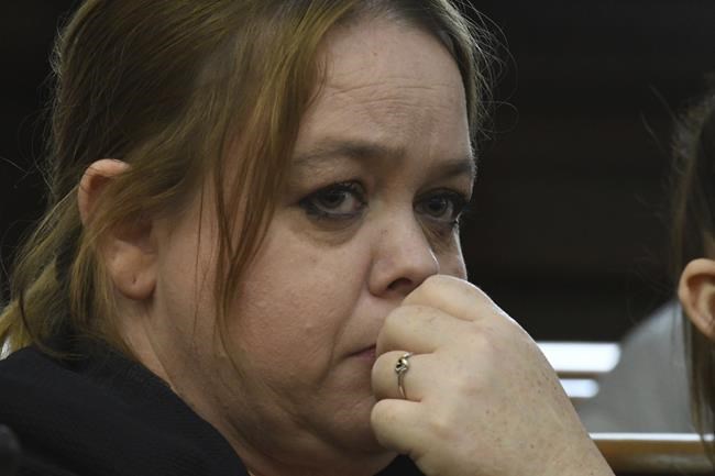 Kyle Rittenhouse mother, Wendy Rittenhouse, watches video testimony during her son's trial at the Kenosha County Courthouse in Kenosha, Wis., on Wednesday, Nov. 3, 2021. Rittenhouse is accused of killing two people and wounding a third during a protest over police brutality in Kenosha, last year. (Mark Hertzberg /Pool Photo via AP)