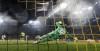 Dortmund's Marco Reus, left, scores a penalty goal against Ajax's keeper Remko Pasveer during the Champions League group C soccer match between Borussia Dortmund and Ajax Amsterdam in Dortmund, Germany, Wednesday, Nov. 3, 2021. (AP Photo/Martin Meissner)