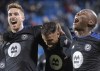 CF Montreal's Rudy Camacho, centre, celebrates with teammates after scoring against Houston Dynamo during second half MLS soccer action in Montreal, Wednesday, November 3, 2021. THE CANADIAN PRESS/Graham Hughes