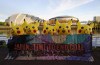 Activists dressed as the Pokemon character Pikachu protest against Japan's support of the coal industry near the COP26 U.N. Climate Summit in Glasgow, Scotland, Thursday, Nov. 4, 2021. The U.N. climate summit in Glasgow gathers leaders from around the world, in Scotland's biggest city, to lay out their vision for addressing the common challenge of global warming. (AP Photo/Alberto Pezzali)