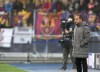 Barcelona's head coach Sergi Barjuan reacts during the Champions League group E soccer match between Dynamo Kyiv and Barcelona at the Olimpiyskiy Stadium in Kyiv, Ukraine, Tuesday, Nov. 2, 2021. (AP Photo/Efrem Lukatsky)