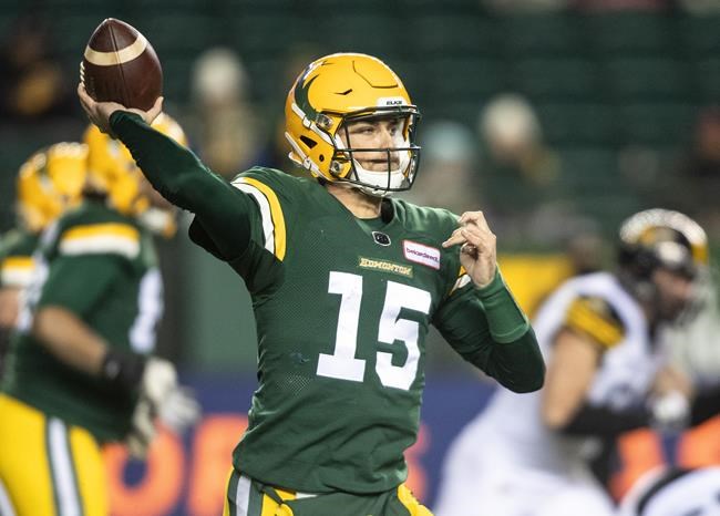 Edmonton Elks quarterback Taylor Cornelius (15) makes the throw against the Hamilton Tiger-Cats during first half CFL action in Edmonton on October 29, 2021. The Nick Arbuckle era in Edmonton will begin soon -- just not this week. Elks coach Jaime Elizondo confirmed that the quarterback, acquired from the Toronto Argonauts before last week’s trade deadline, will be holding the clipboard this Friday when Edmonton hosts Saskatchewan. Taylor Cornelius will keep the starting job when the Elks (2-7) host the Saskatchewan Roughriders (7-4). THE CANADIAN PRESS/Jason Franson.