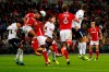 Barnsley's Zeki Fryers, second left, and Barnsley's Ike Ugbo, third left, defend in the goal mouth during the English League Cup soccer match between Tottenham Hotspur and Barnsley at Wembley stadium in London on September 19, 2017. THE CANADIAN PRESS/AP, Kirsty Wigglesworth