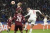 Lyon's Islam Slimani heads the ball and scores his side's second goal during the Europa League Group A match between Lyon and Sparta Prague at the Groupama stadium in Lyon, France, Thursday, Nov.4, 2021. (AP Photo/Laurent Cipriani)