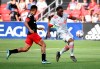 Toronto FC's Ayo Akinola, right, shoots and scores in front of D.C. United's Andy Najar during the first half of an MLS soccer match Saturday, July 3, 2021, in Washington.&nbsp; THE CANADIANPress/The Washington Post via AP-Will Newton
