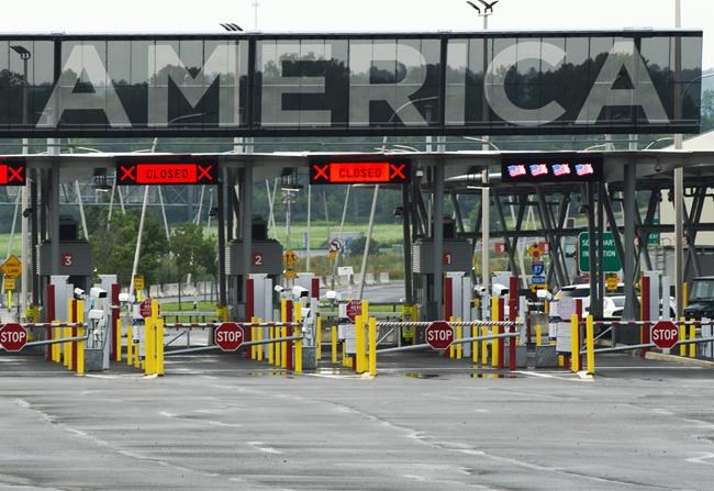The U.S. border crossing is seen in Lacolle, Que., Monday, Aug. 9, 2021. An end to the 20-month closure of the world's longest undefended frontier marks a sign that restrictions are loosening and more international leisure travel may be on the horizon. THE CANADIAN PRESS/Ryan Remiorz