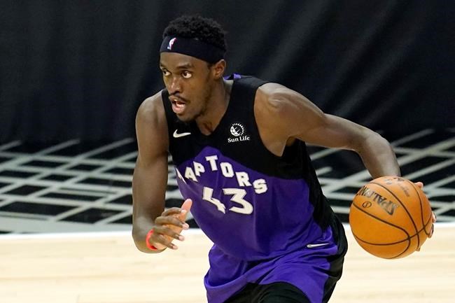 Toronto Raptors forward Pascal Siakam dribbles during an NBA basketball game against the Los Angeles Clippers, in Los Angeles, May 4, 2021. THE CANADIAN PRESS/AP-Marcio Jose Sanchez