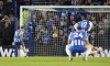 Brighton's Leandro Trossard, left, scores during the English Premier League match between Brighton and Hove Albion and Newcastle United at the AMEX Stadium, Brighton, England, Saturday Nov. 6, 2021. (Gareth Fuller/PA via AP)