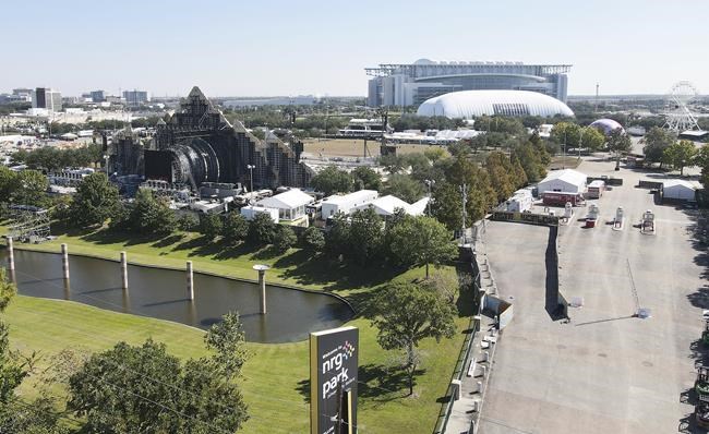 A drone image shows the stage area at Astroworld on Saturday, Nov. 6, 2021 in Houston. Several people died and numerous others were injured in what officials described as a surge of the crowd at the music festival while Travis Scott was performing Friday night. (Elizabeth Conley/Houston Chronicle via AP)