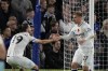 Burnley's Matej Vydra, right, celebrates after scoring his side's opening goal during the English Premier League soccer match between Chelsea and Burnley at the Stamford Bridge stadium in London, Saturday, Nov. 6, 2021. (AP Photo/Frank Augstein)