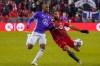 Toronto FC defender Justin Morrow (2) clears the ball before Pacific FC forward Gianni dos Santos (24) can reach it during second half Canadian Championship semifinal action in Toronto on Wednesday, November 3, 2021. THE CANADIAN PRESS/Evan Buhler