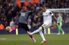 Leicester City's Youri Tielemans, left, and Leeds United's Raphinha battle for the ball during the English Premier League soccer match between Leeds and Leicester Citt at Elland Road, Leeds, England, Sunday Nov. 7, 2021. (Richard Sellers/PA via AP)