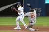 Toronto Blue Jays' Marcus Semien throws to first to complete a double play on Baltimore Orioles' Trey Mancini after forcing out Austin Hays in the fourth inning of an American League baseball game in Toronto on Friday, Oct. 1, 2021. The Toronto infielder won an American League Gold Glove at second base. It was the 31-year-old’s first time winning the award. THE CANADIAN PRESS/Jon Blacker