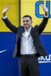 FC Barcelona's new coach Xavi Hernandez gestures during his official presentation at the Camp Nou stadium in Barcelona, Spain, Monday, Nov. 8, 2021. Xavi, who thrived in Barcelona’s midfield alongside Messi and Andres Iniesta, was officially introduced as coach on the field of the Camp Nou with a reception usually only offered to top players. (AP Photo/Joan Monfort)