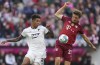 Hoffenheim's Chris Richards, left, challenges for the ball with Bayern's Thomas Mueller during the German Bundesliga soccer match between Bayern Munich and TSG 1899 Hoffenheim at the Allianz Arena stadium in Munich, Germany, Saturday, Oct. 23, 2021. (AP Photo/Matthias Schrader)