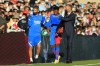 Barcelona's Ansu Fati, centre, walks off injured during a Spanish La Liga soccer match between Celta and Barcelona at the Balaidos stadium in Vigo, Spain, Saturday, Nov. 6, 2021. (AP Photo/Lalo R. Villar)