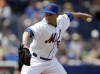 FILE - New York Mets relief pitcher Pedro Feliciano throws during the fifth inning of an exhibition spring training baseball game against the Washington Nationals, Saturday, March 23, 2013, in Port St. Lucie, Fla. Former Mets reliever Feliciano, who pitched so often he earned the nickname “Perpetual Pedro,” has died. He was 45. Friends and former teammates told the Mets that Feliciano was found dead in his sleep Monday, Nov. 8, 2021, at home in Puerto Rico. (AP Photo/Jeff Roberson, File)