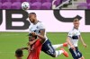 Vancouver Whitecaps defender Derek Cornelius (13) wins a header over Toronto FC forward Ayo Akinola during the second half of an MLS soccer match, Saturday, April 24, 2021, in Orlando, Fla. THE CANADIAN PRESS/AP-Phelan M. Ebenhack