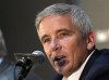 FILE - PGA Tour Commissioner Jay Monahan answers a reporter's question during a news conference ahead of the Zozo Championship PGA Tour at Accordia Golf Narashino C.C. in Inzai, east of Tokyo, Japan, Wednesday, Oct. 23, 2019. Monahan is contemplating plans to increase pay for top players, mainly through more prize money and bonus programs. (AP Photo/Lee Jin-man, File)