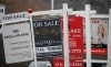 Real estate for sale signs are shown in Oakville, Ont. on Saturday, Dec.1, 2018.&nbsp; THE CANADIAN PRESS/Richard Buchan