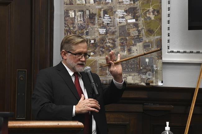 Dr. Douglas Kelley, a forensic pathologist with the Milwaukee County Medical Examiner's Office, testifies in Kyle Rittenhouse's trial at the Kenosha County Courthouse in Kenosha, Wis., on Tuesday, Nov. 9, 2021. Rittenhouse is accused of killing two people and wounding a third during a protest over police brutality in Kenosha, last year. (Mark Hertzberg /Pool Photo via AP)