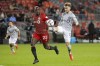 CF Montreal's Djordje Mihailovic (right) controls the ball ahead of Toronto FC's Chris Mavinga during first half MLS action in Toronto on Saturday, October 23, 2021. Montreal will host the Canadian Championship final against Toronto FC on Nov. 21 at Stade Saputo.THE CANADIAN PRESS/Chris Young