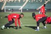 Team Canada's Derek Cornelius, left, and Alphonso Davies take part in a practice session in Edmonton, Alta., on Wednesday November 10, 2021. Canada takes on Costa Rica in their World Cup match on Friday November 12, 2021. THE CANADIAN PRESS/Jason Franson
