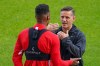 Canada men's national soccer team head coach John Herdman, right, speaks with Mark-Anthony Kaye of the Canada men's national soccer team during a train session in Toronto on Tuesday, October 12, 2021. THE CANADIAN PRESS/Evan Buhler
