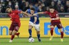 Italy's Federico Chiesa, center, runs with the ball during the World Cup 2022 group C qualifying soccer match between Italy and Switzerland at Rome's Olympic stadium, Friday, Nov. 12, 2021. (AP Photo/Gregorio Borgia)