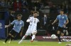 Argentina's Lionel Messi, 10, kicks a ball during a qualifying soccer match against Uruguay for the FIFA World Cup Qatar 2022 in Montevideo, Uruguay, Friday, Nov. 12, 2021. (Ernesto Ryan/Pool Via AP)