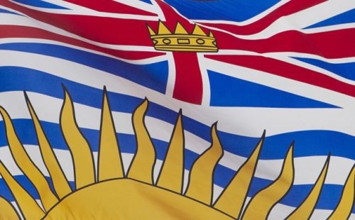 British Columbia's provincial flag flies on a flag pole in Ottawa, Friday July 3, 2020. Heavy rain across B.C. has led to several closures on major highways connecting the Lower Mainland and the Interior region of the province. THE CANADIAN PRESS/Adrian Wyld