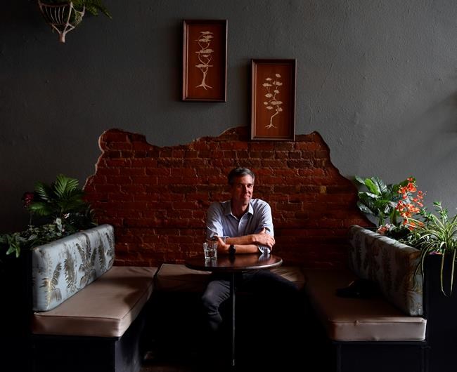 FILE - Democrat Beto O'Rourke poses at the Majestic coffeehouse in Abilene, Texas in this June 5, 2021 file photo. O’Rourke is running for governor of Texas. The former El Paso congressman announced his decision Monday, Nov. 15.(Ronald W. Erdrich/The Abilene Reporter-News via AP, File)