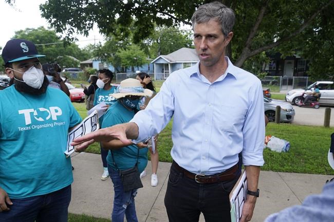 FILE - Democrat Beto O'Rourke speaks to Texas Organizing Project volunteers preparing to canvass a neighborhood in this June 9, 2021 file photo. O’Rourke is running for governor of Texas. The former El Paso congressman announced his decision Monday, Nov. 15. (AP Photo/LM Otero, File)