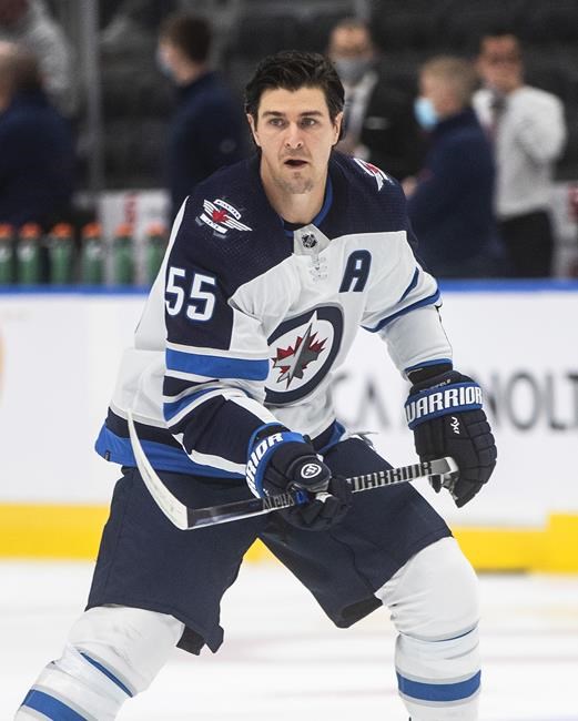 Winnipeg Jets' Mark Scheifele (55) skates during warm up before taking on the Edmonton Oilers during NHL preseason action in Edmonton on Saturday, October 2, 2021.THE CANADIAN PRESS/Jason Franson