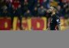 Netherlands' Memphis Depay reacts after Montenegro's Nikola Vujnovic scoring his side's second goal during the World Cup 2022 group G qualifying soccer match between Montenegro and Netherlands, at the City stadium in Podgorica, Montenegro, Saturday, Nov. 13, 2021. (AP Photo/Risto Bozovic)