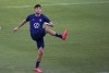 United States' Christian Pulisic warms up during a training session ahead of the World Cup 2022 qualifying soccer match against Jamaica in Kingston, Monday, Nov. 15, 2021.(AP Photo/Fernando Llano)