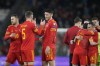 Wales players celebrate at the end of the World Cup 2022 group E qualifying soccer match between Wales and Belgium at Cardiff City stadium in Cardiff, Wales, Tuesday, Nov. 16, 2021. (AP Photo/Frank Augstein)