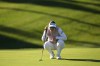 Hannah Green of Australia lines up a putt on the first hole during the third round of the BMW Ladies Championship at LPGA International Busan in Busan, South Korea, Saturday, Oct. 23, 2021. (AP Photo/Lee Jin-man)