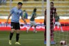 Uruguay's Agustin Alvarez Martínez, left, and goalie Fernando Muslera look at the ball after Bolivia's Marcelo Martins scored his team's second goal during a FIFA World Cup qualifying match at Hernando Siles stadium in La Paz, Bolivia, Tuesday, Nov. 16, 2021. (AP Photo/Juan Karita)