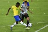 Brazil's Vini Jr, left, and Argentina's Nahuel Molina battle for the ball during a qualifying soccer match for the FIFA World Cup Qatar 2022 at Bicentenario stadium in San Juan, Argentina, Tuesday, Nov. 16, 2021. (AP Photo/Gustavo Garello)