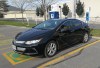 An electric car is plug into a charging station at Lansdowne Mall in Peterborough, Ontario on Sunday June 17, 2018. THE CANADIAN PRESS/Doug Ives