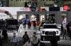 Cars from various automakers are displayed at the AutoMobility LA auto show Wednesday, Nov. 17, 2021, in Los Angeles. (AP Photo/Marcio Jose Sanchez)