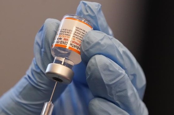 Paramedic Rebecca Hoke prepares a dose of the Pfizer-BioNTech COVID-19 vaccine for children 5 to 12 years old at a vaccination site in Fort Worth, Texas, Thursday, Nov. 11, 2021. The federal government is set to announce Friday that Health Canada has approved the COVID-19 vaccine for children aged five to 11. THE CANADIAN PRESS/AP-LM Otero
