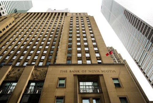 The Bank of Nova Scotia building is shown in the financial district in Toronto on Tuesday, August 22, 2017. Canadians eyeing internships, co-op placements and graduate positions at Scotiabank no longer have to polish up their resumes. THE CANADIAN PRESS/Nathan Denette