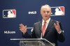 Major League Baseball commissioner Rob Manfred responds to a question Thursday, Nov. 18, 2021, during a news conference in Chicago. (AP Photo/Charles Rex Arbogast)