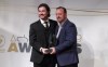 Cavalry FC’s Tommy Wheeldon Jr., left, receives his coach of the year award from commissioner David Clanachan, in Toronto, Tuesday, Nov. 26, 2019. THE CANADIAN PRESS/Neil Davidson