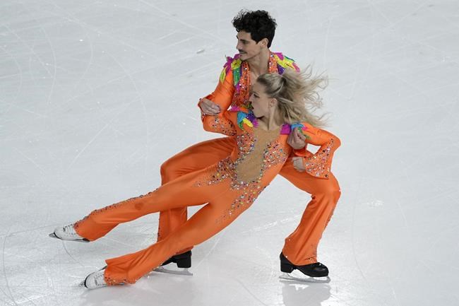Piper Gilles and Paul Poirier of Canada compete in the Ice Dance Rhythm Dance during the ISU figure skating France's Trophy, in Grenoble, French Alps, France, Friday, Nov. 19, 2021. THE CANADIAN PRESS/AP-Francois Mori