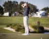 Mackenzie Hughes, of Canada, reacts to a missed birdie putt on the 18th green during the second round of the RSM Classic golf tournament, Friday, Nov. 19, 2021, in St. Simons Island, Ga. (AP Photo/Stephen B. Morton)